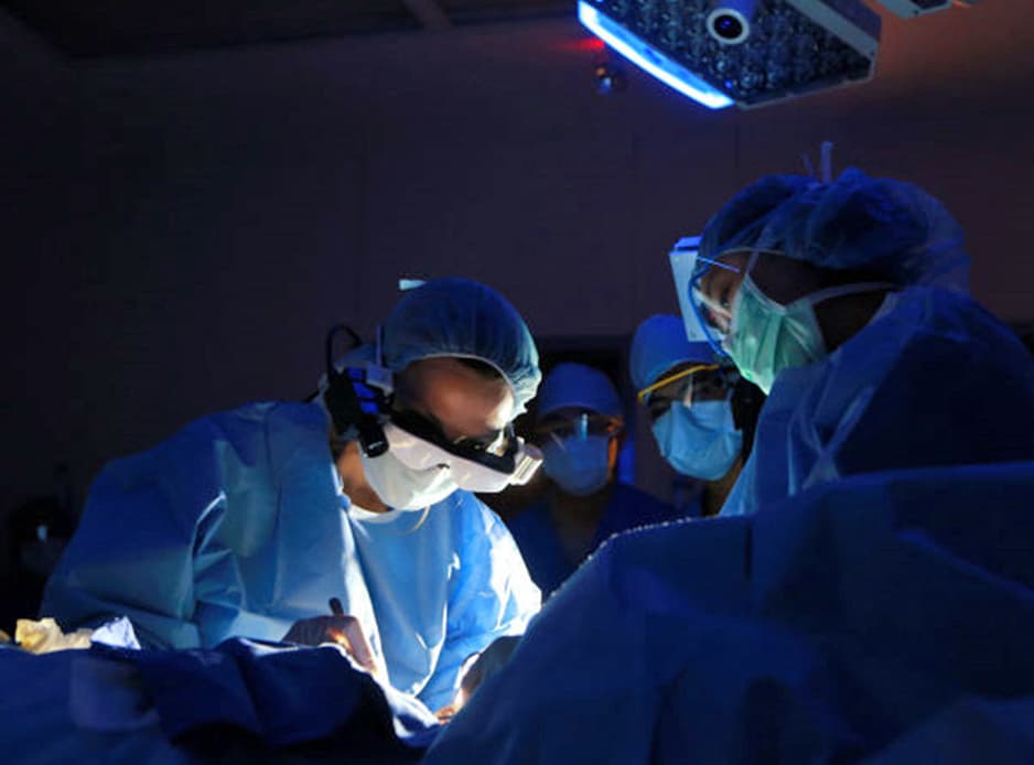 Surgeon using Vision Pro in OR